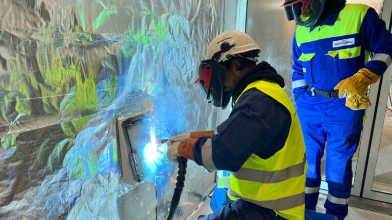 New-Build Holds ‘Lucky Coin’ Ceremony as Launch Nears