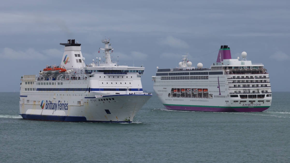Ferry and Cruise Ship Passing Each Other