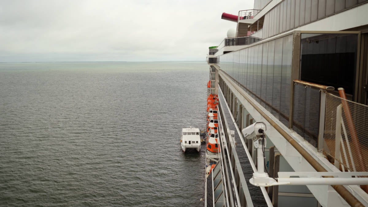 Carnival Cruise Ship and Small Boat