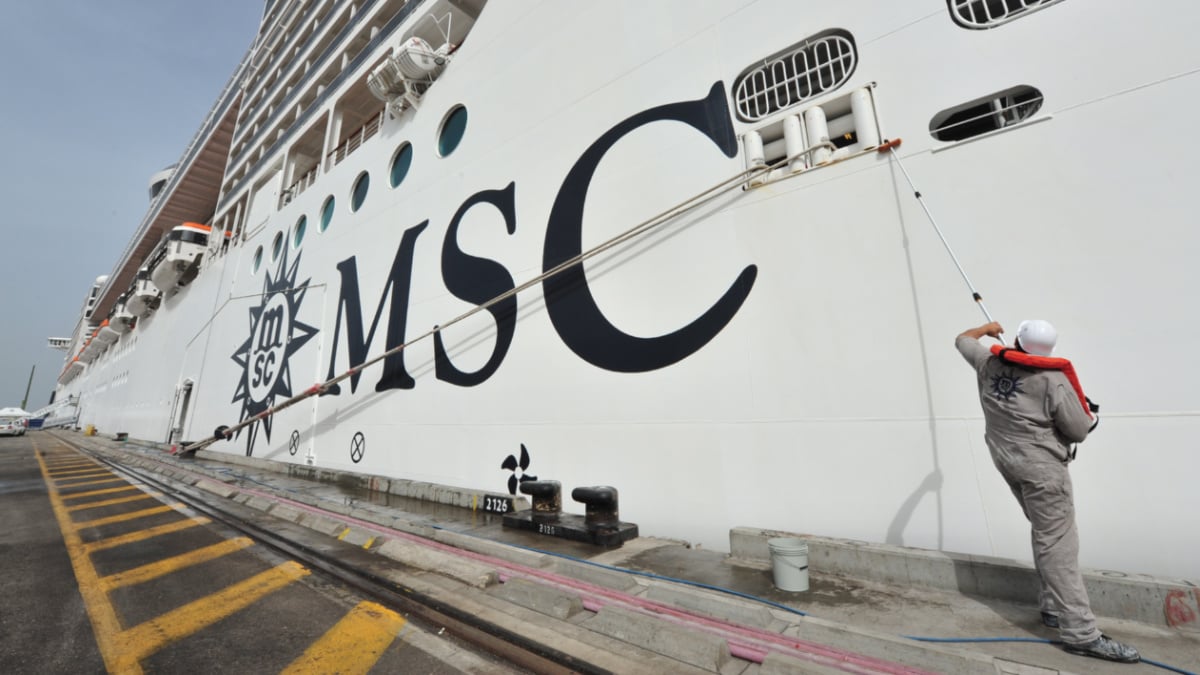 Crew Member Cleaning MSC Cruise Ship