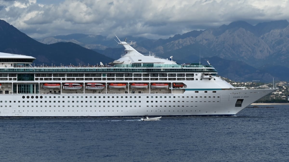 Vision of the Seas Cruise Ship With Dark Clouds